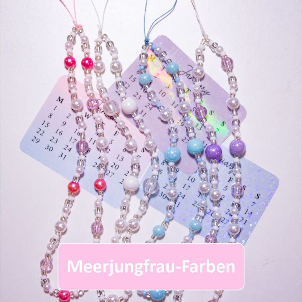 Handyanhänger und Sticker in Meerjungfrauen Farben, pink, lila und blau
